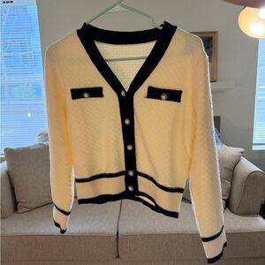Classic Cream Knit Cardigan with Black Trim